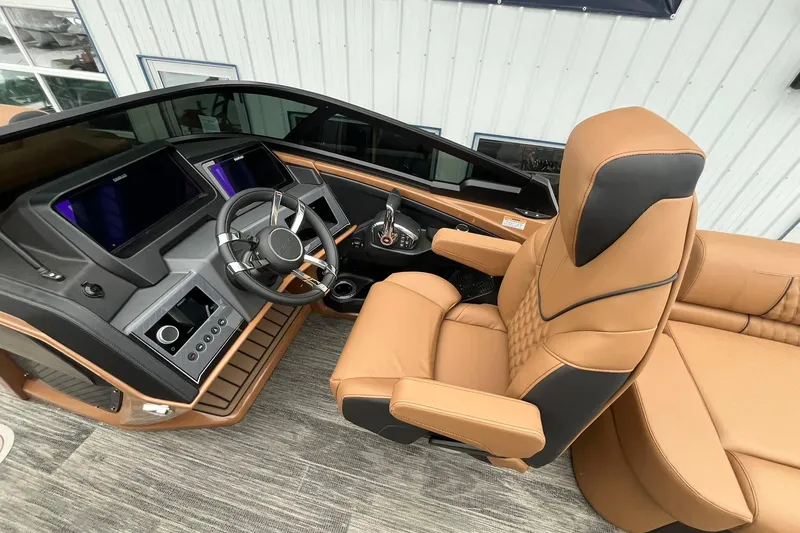 Slide: The Image of Luxurious interior of 2026 Avalon Excalibur LTD Quad Lounge with leather seating and modern dashboard. - 34