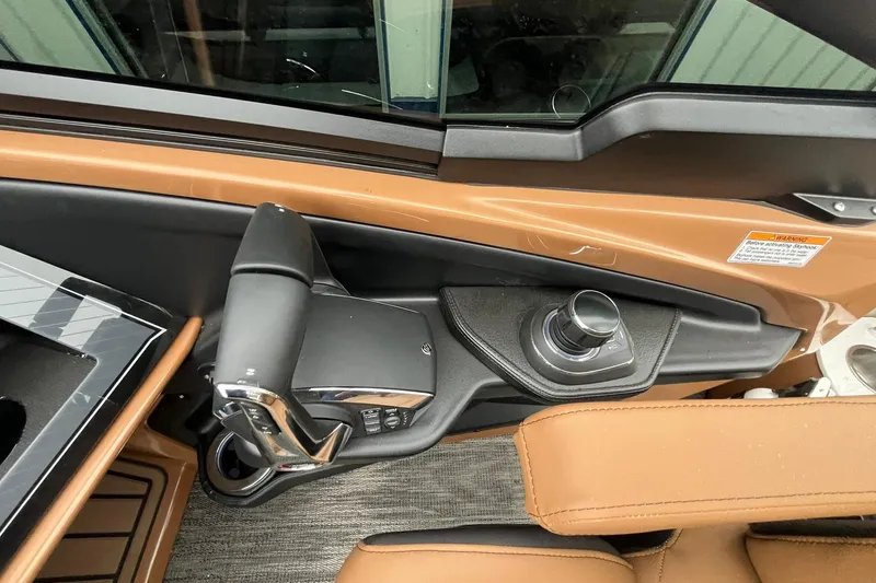 Slide: The Image of 2026 Avalon Excalibur LTD Quad Lounge boat control panel with sleek design and modern features. - 35