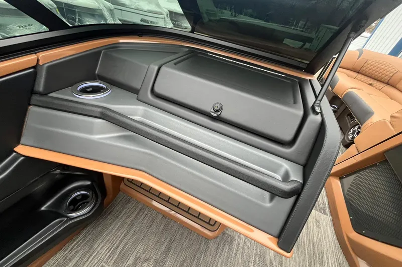 Slide: The Image of 2026 Avalon Excalibur LTD Quad Lounge interior with sleek design and cup holders. - 41