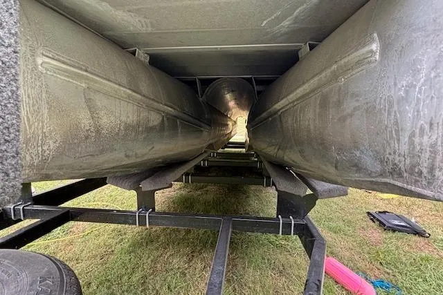 Slide: The Image of Underneath view of 2022 Aloha Pontoon Tropical 260 on a trailer. - 8