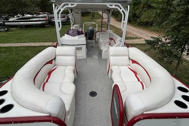 Slide: The Image of 2022 Aloha Pontoon Tropical 260 with spacious seating and modern design. - 9