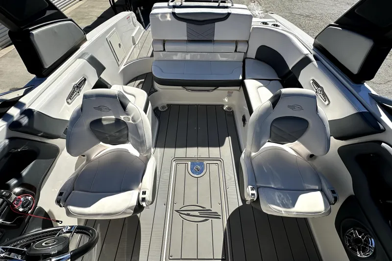 Slide: The Image of 2021 Chaparral 26 Surf boat interior with luxurious seating and modern design. - 13