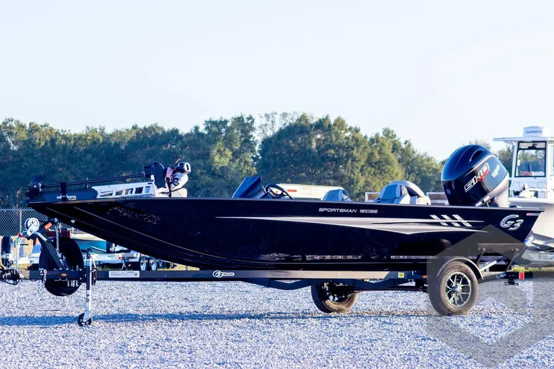 The Image of 2026 G3 Sportsman 1810 SE boat on trailer, parked outdoors. - 1