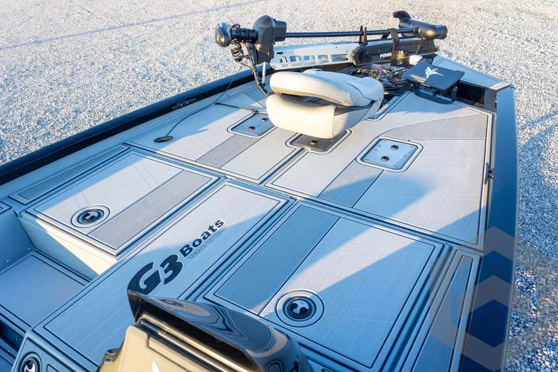 Slide: The Image of 2026 G3 Sportsman 1810 SE boat deck with seating and storage compartments. - 16