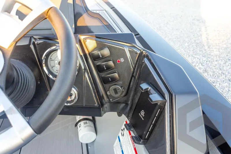 Slide: The Image of Dashboard of 2026 G3 Sportsman 1810 SE boat with steering wheel and controls. - 29