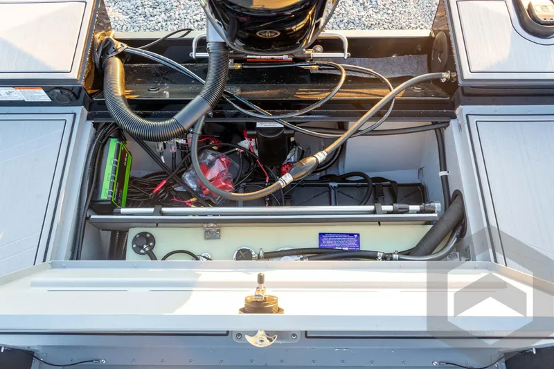 Slide: The Image of 2026 G3 Sportsman 1810 SE boat engine compartment with wiring and components. - 34