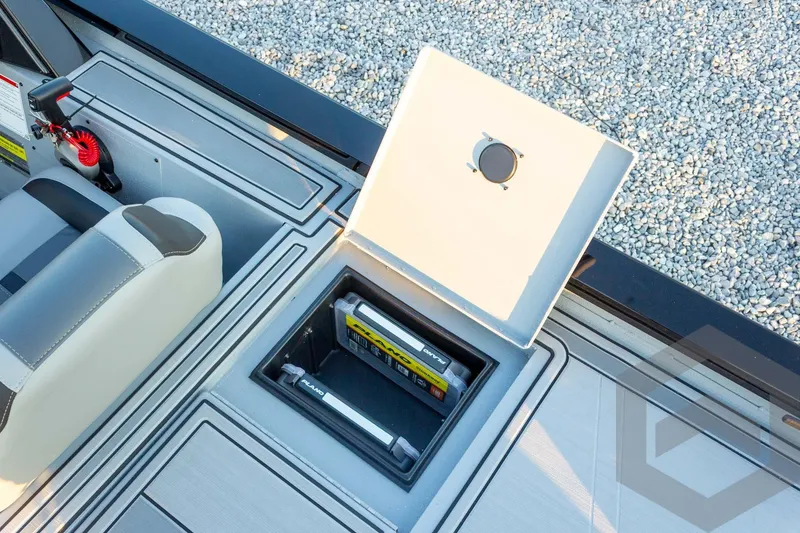 Slide: The Image of 2026 G3 Sportsman 1810 SE boat interior with open storage compartment and seating. - 36