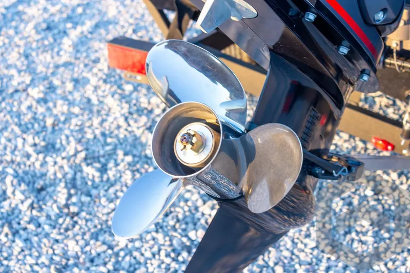 Slide: The Image of Close-up of a 2026 G3 Sportsman 1810 SE boat propeller on gravel. - 38