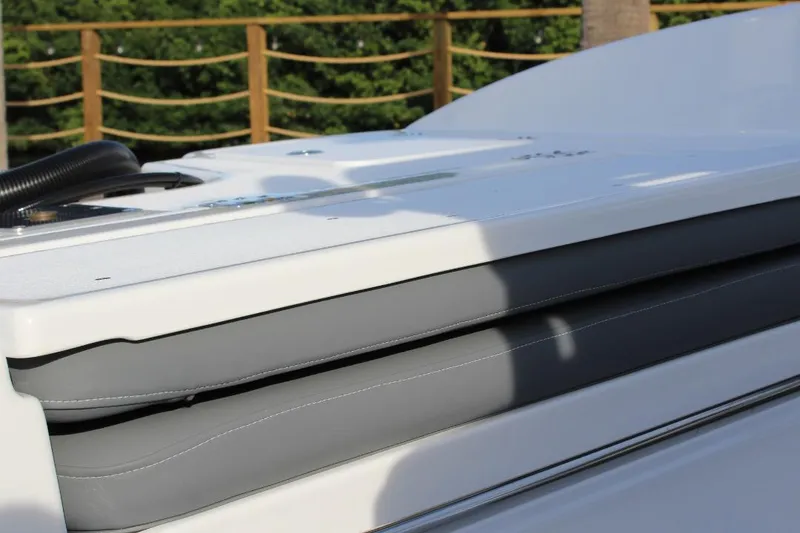Slide: The Image of 2025 NauticStar 251 Hybrid boat seat detail with sleek design and modern features. - 10