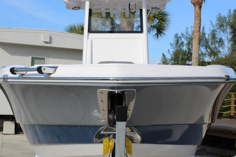 Slide: The Image of 2025 NauticStar 251 Hybrid boat front view, showcasing sleek design and modern features. - 4