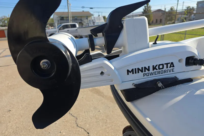 Slide: The Image of Minn Kota PowerDrive motor on 2019 Bayliner Element E16 boat, close-up view. - 17