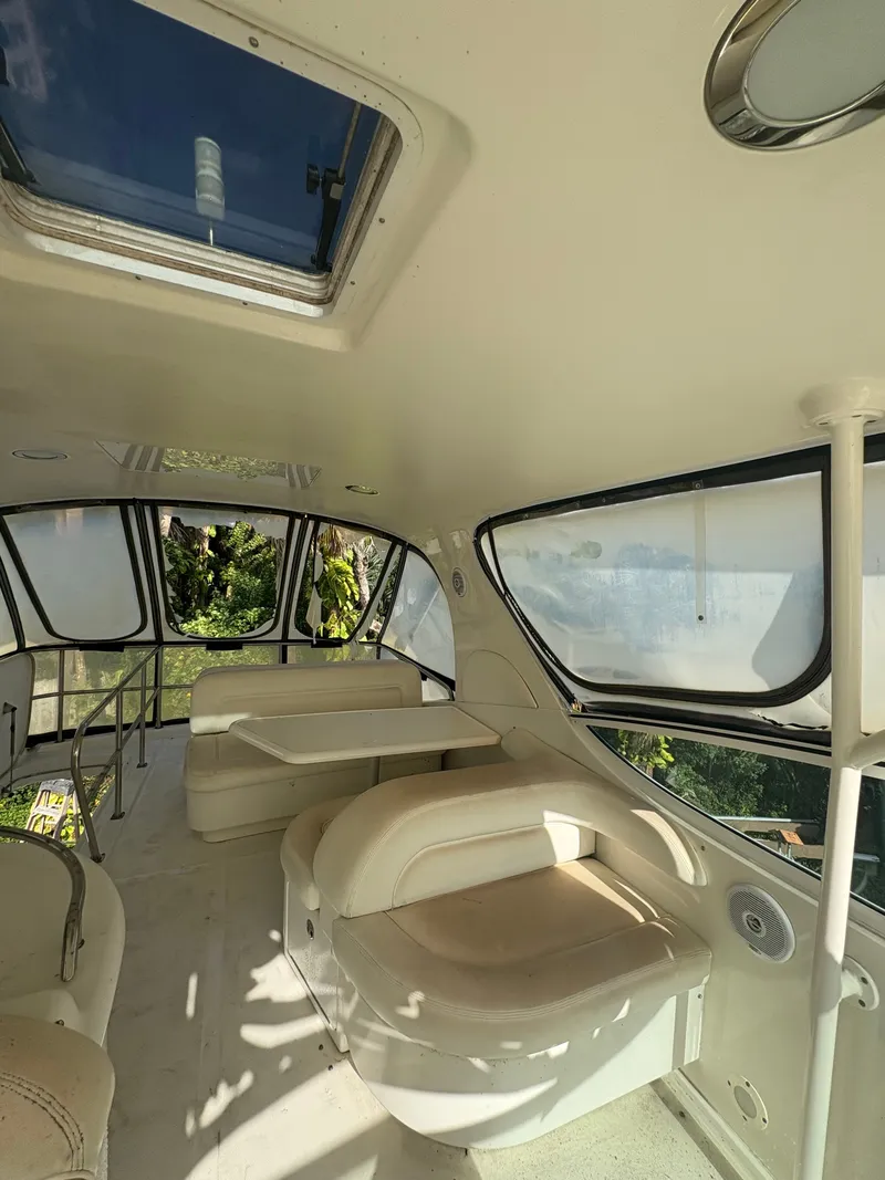 Slide: The Image of Interior of a 2001 Sea Ray Five Forty yacht with seating area. - 36