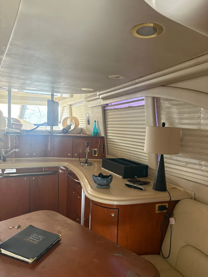 Slide: The Image of Interior of a 2001 Sea Ray Five Forty yacht with kitchen. - 38
