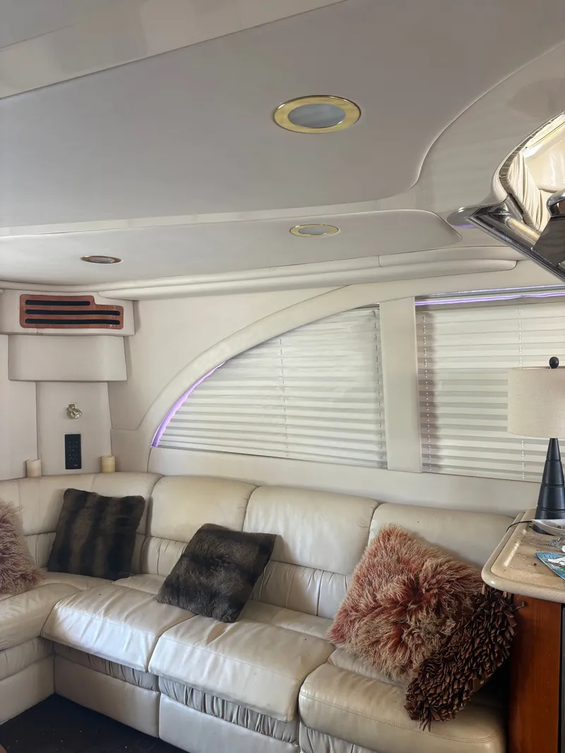 Slide: The Image of Interior of a 2001 Sea Ray Five Forty yacht with leather sofa and cushions. - 40