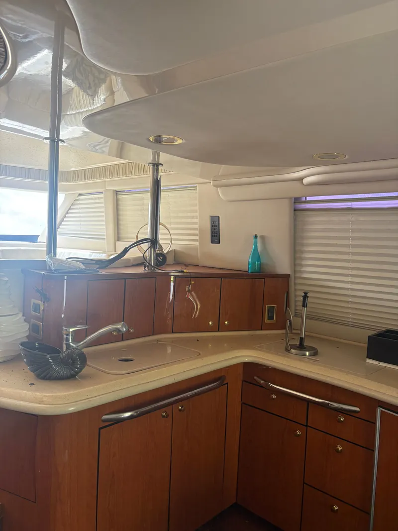 Slide: The Image of Interior of 2001 Sea Ray Five Forty yacht featuring modern kitchen. - 42
