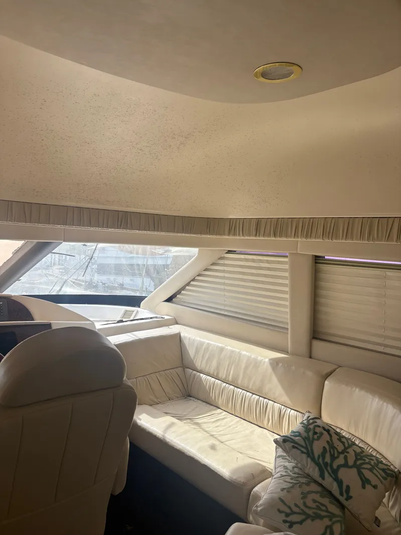 Slide: The Image of Interior of a 2001 Sea Ray Five Forty yacht with leather seating. - 46