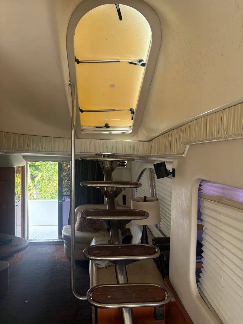 Slide: The Image of Interior of a 2001 Sea Ray Five Forty yacht with stairs and hatch. - 48