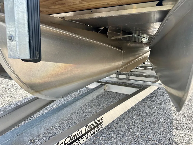 Slide: The Image of 2021 Harris Grand Mariner 250 pontoon boat on McClain trailer, close-up view. - 9