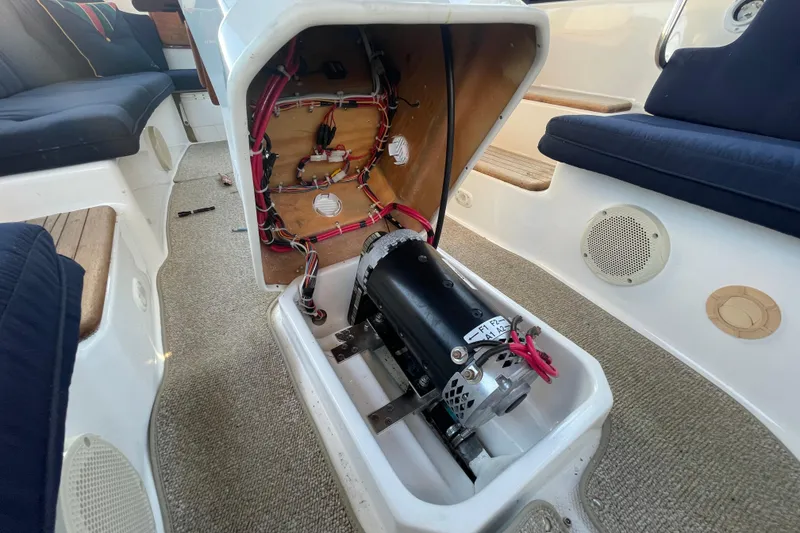 Slide: The Image of 2017 ElectraCraft 18 LS boat interior showing motor and wiring details. - 12