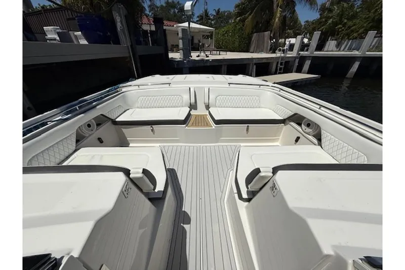 Slide: The Image of 2021 World Cat 400 DC-X boat interior with spacious seating and elegant design. - 12