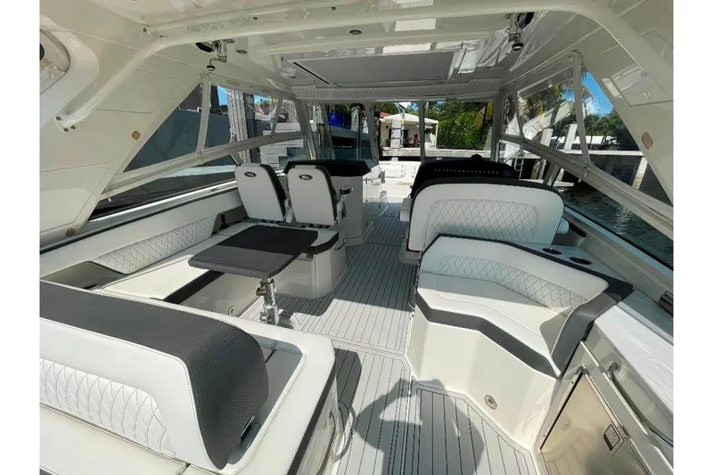 Slide: The Image of Luxurious interior of 2021 World Cat 400 DC-X boat with modern seating and sleek design. - 22