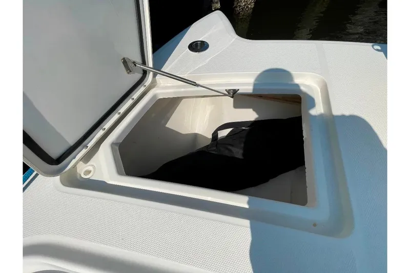 Slide: The Image of Open storage compartment on 2021 World Cat 400 DC-X boat deck. - 31