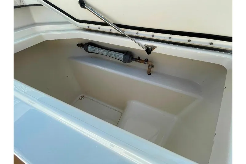 Slide: The Image of Open storage compartment in 2021 World Cat 400 DC-X boat. - 38