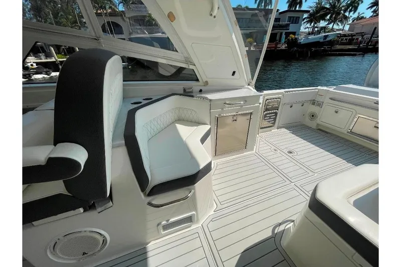 Slide: The Image of 2021 World Cat 400 DC-X boat interior with luxurious seating and modern design. - 45
