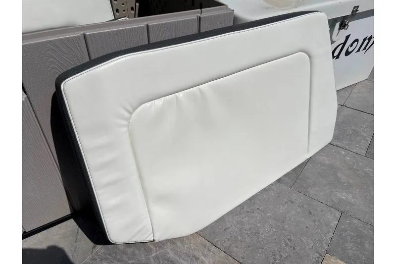 Slide: The Image of White cushion for 2021 World Cat 400 DC-X boat on stone surface. - 50