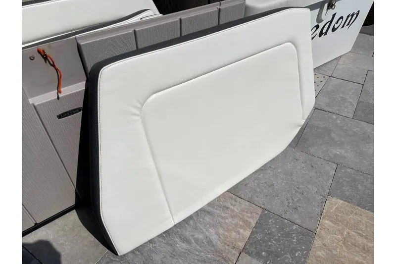 Slide: The Image of Cushioned seat from 2021 World Cat 400 DC-X boat on tiled surface. - 51
