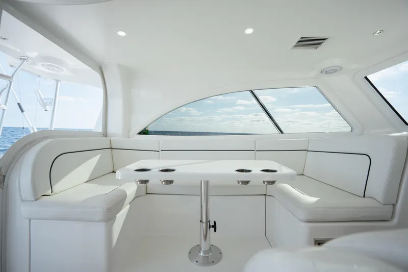 Slide: The Image of Luxurious interior of 2018 Viking 37 Billfish yacht with white seating and ocean view. - 20