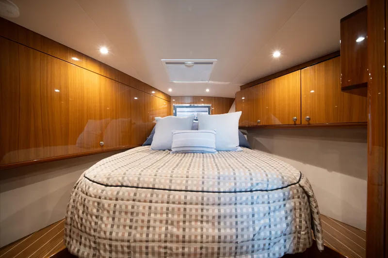Slide: The Image of Luxurious cabin interior of 2018 Viking 37 Billfish yacht with elegant wood finish. - 24
