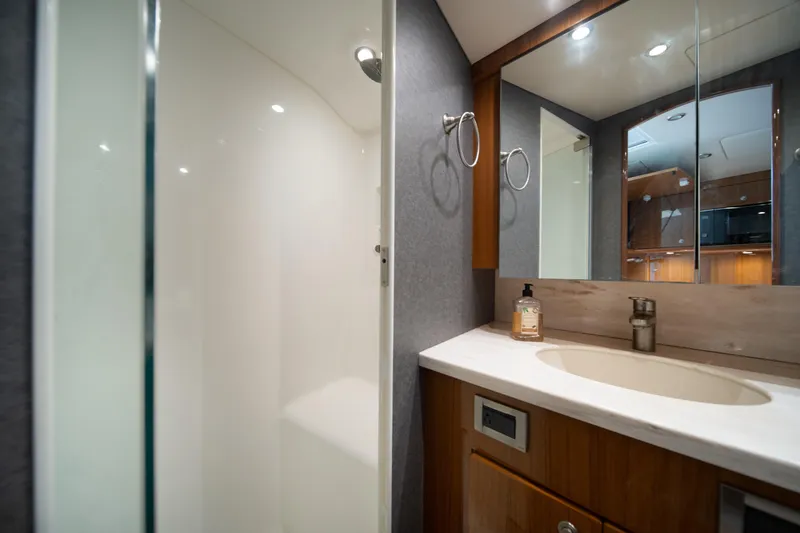 Slide: The Image of Luxurious bathroom interior of 2018 Viking 37 Billfish yacht with modern fixtures. - 27