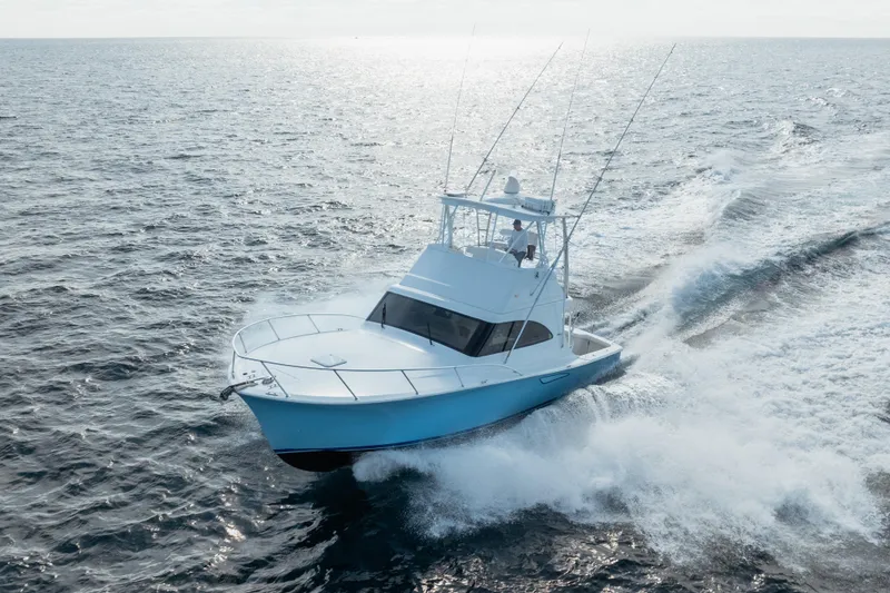 Slide: The Image of 2018 Viking 37 Billfish cruising on open ocean waters. - 29