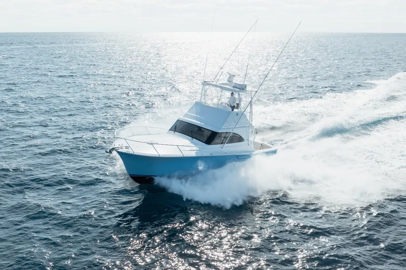 Slide: The Image of 2018 Viking 37 Billfish yacht cruising on open ocean waters. - 30