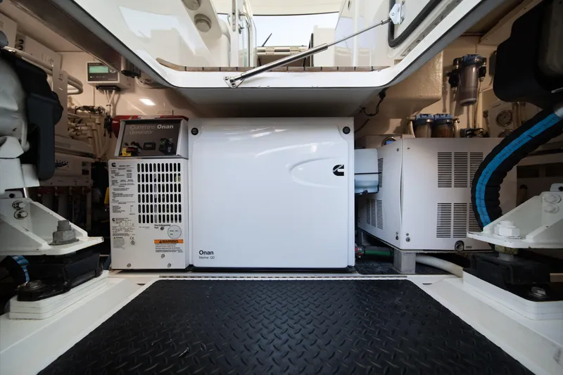 Slide: The Image of Engine room of 2018 Viking 37 Billfish with Cummins Onan generator. - 39