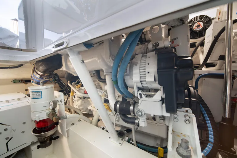 Slide: The Image of Engine room of 2018 Viking 37 Billfish, showcasing mechanical components and systems. - 43