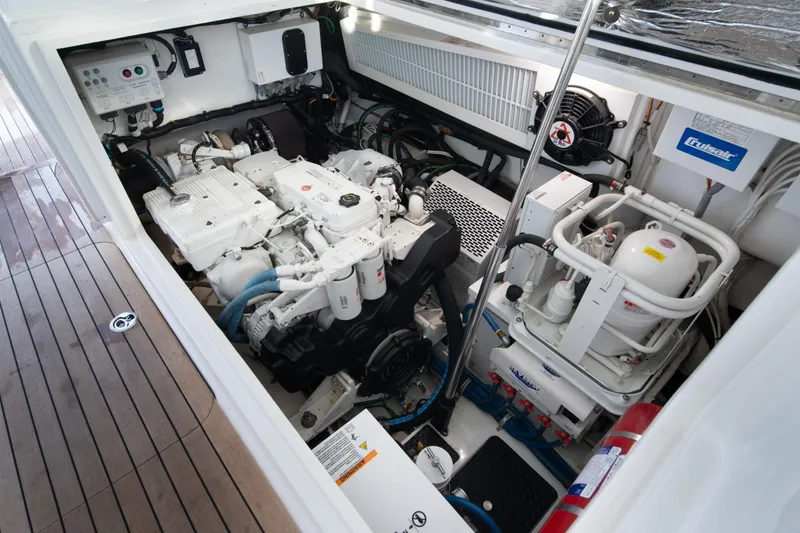 Slide: The Image of Engine room of 2018 Viking 37 Billfish yacht, showcasing mechanical components and systems. - 44