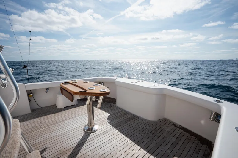 Slide: The Image of 2018 Viking 37 Billfish yacht deck with ocean view and clear sky. - 7