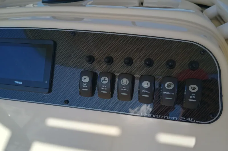 Slide: The Image of Control panel of Grady-White Fisherman 236 boat, year 2026. - 20