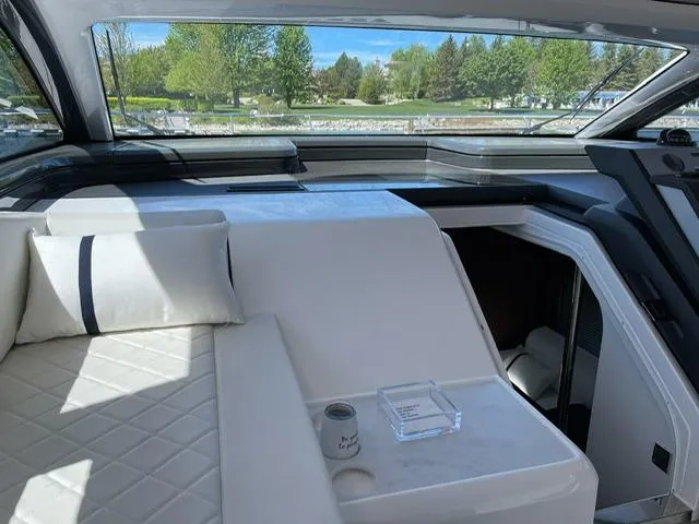 Slide: The Image of Luxurious interior of 2020 Fairline 45/43 Targa yacht with elegant seating and scenic views. - 12