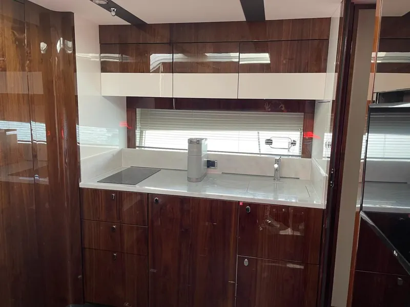 Slide: The Image of Luxurious kitchen interior of 2020 Fairline 45/43 Targa yacht with sleek cabinetry. - 13