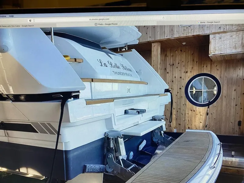 Slide: The Image of Fairline 45/43 Targa 2020 yacht docked indoors, featuring sleek design and wooden interior. - 8