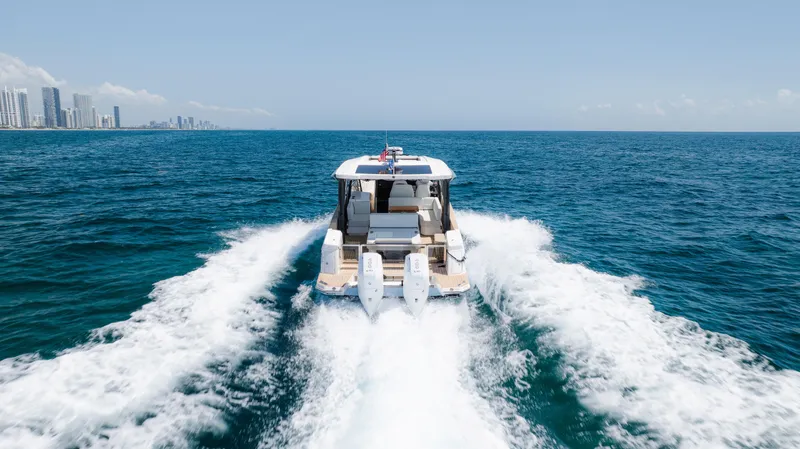Slide: The Image of 2024 Saxdor 400 GTO cruising on open sea under clear sky. - 41