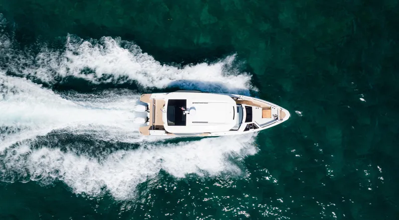 Slide: The Image of 2024 Saxdor 400 GTO boat cruising on open water. - 7