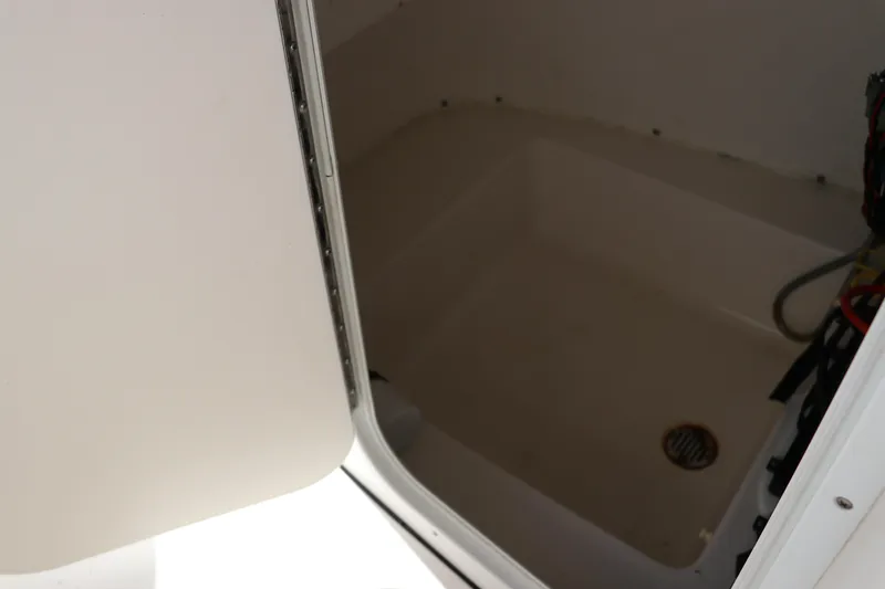 Slide: The Image of Control panel of 2016 Tidewater 220 LXF boat with Garmin GPS and radio equipment. - 17