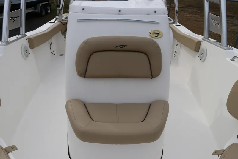 Slide: The Image of Close-up of 2016 Tidewater 220 LXF boat emblem on white surface. - 20