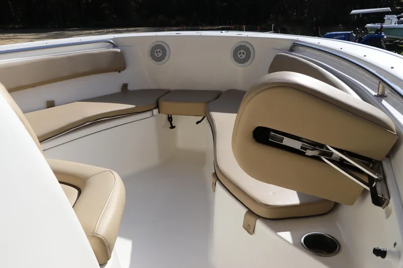 Slide: The Image of Interior view of a 2016 Tidewater 220 LXF boat compartment with a fire extinguisher. - 23