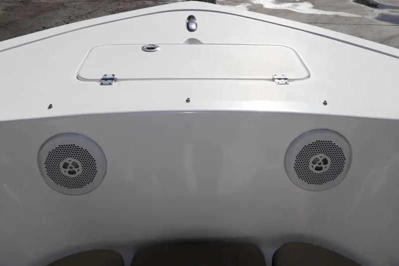 Slide: The Image of 2016 Tidewater 220 LXF boat with beige cushioned seating. - 29