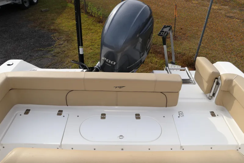 Slide: The Image of Open storage compartment on 2016 Tidewater 220 LXF boat. - 6